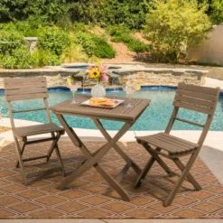 Positano 3pc Acacia Wood Foldable Bistro Set: Weather-Resistant, Space-Saving - Christopher Knight Home -FurniVerse Store GUEST be8ce26b ae18 4977 8c29 3ea1beade409